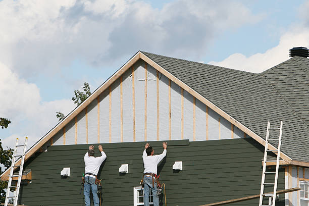 Professional Siding Installation technician working in Leasburg, NC